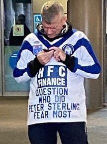 A Bulldogs fan shows his support for one of the club’s former greats ....