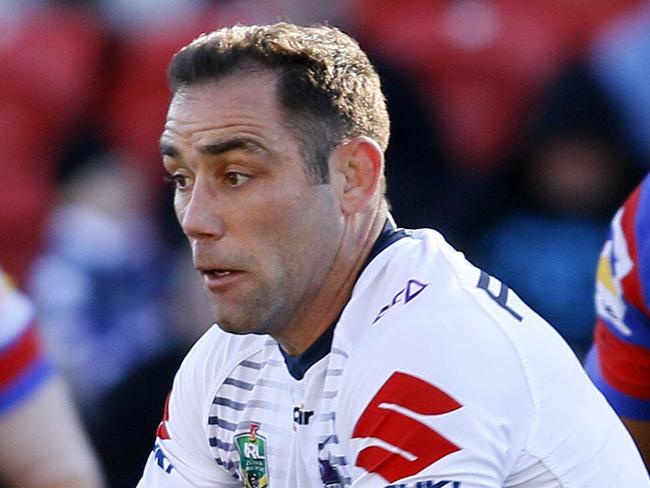 Cameron Smith of the Storm makes a break  during the Round 15 NRL match between the Newcastle Knights and the Melbourne Storm at McDonald Jones Stadium in Newcastle, Sunday, June 17, 2018. (AAP Image/Darren Pateman) NO ARCHIVING, EDITORIAL USE ONLY