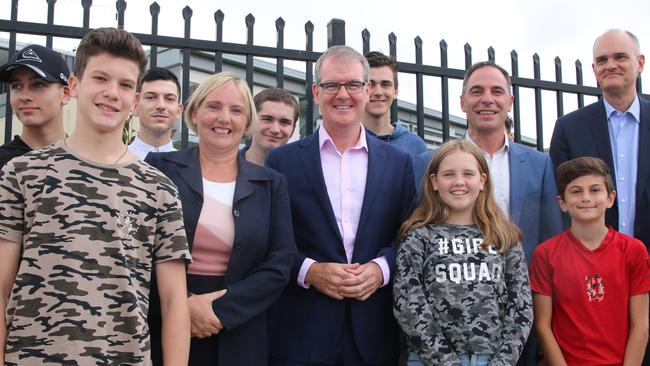 Riverstone Labor candidate Annemarie Christie, Michael Daley and Jihad Dib with children from The Ponds.