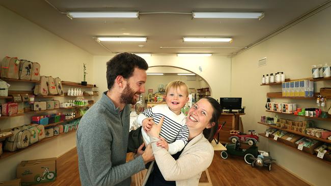 Thomas Griffith, 27, and his partner Louisa Fergusson, 32, share working and caring for son Hugh, 18 months. Picture: SAM ROSEWARNE.