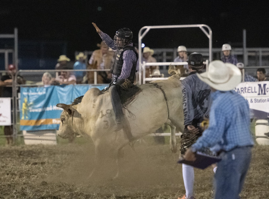 Zane Hall rides in the junior bullride at the Lawrence Twilight Rodeo. Picture: Adam Hourigan