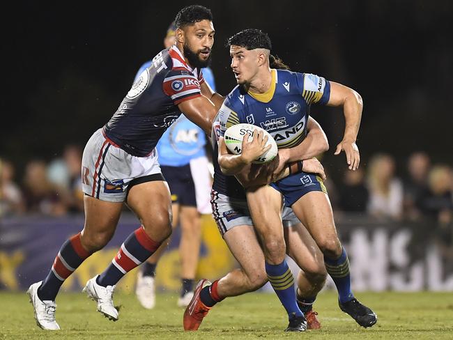 Dylan Brown of the Eels is tackled during the round 20 NRL match between the Sydney Roosters and the Parramatta Eels at BB Print Stadium in Mackay. Picture: Albert Perez/Getty Images