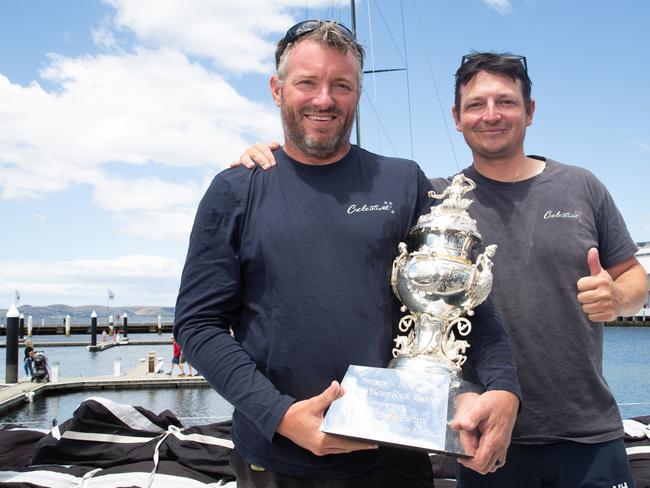 Tasmanian Sailors Alex Nolan and David Chapman on board Celestial with the Tattersalls cup after winning overall honours for the 2024 Rolex Sydney to Hobart Picture: Linda Higginson