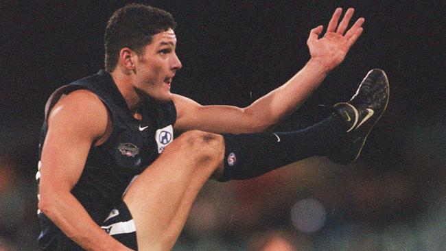 Brendan Fevola kicks for goal during the Millennium match. Picture: George Salpigtidis