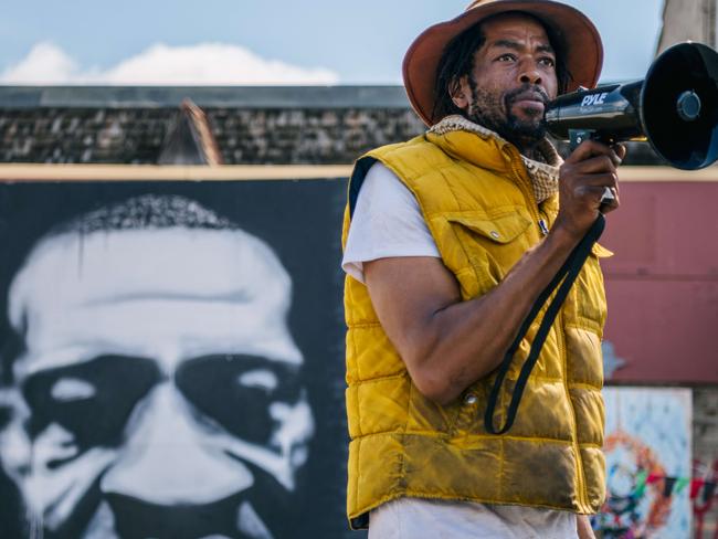 A community leader speaks at George Floyd Corner in Minneapolis. Picture: Getty