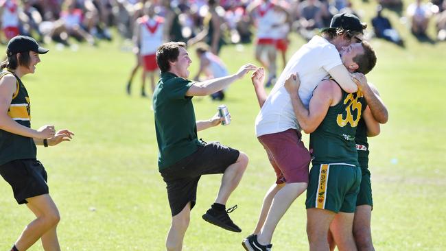 Myponga/Sellicks supporters run on and hug their players at the end of the Great Southern Football League reserves grand final in 2018. The club may well be celebrating an A Grade flag in 2022. Picture: Mark Brake