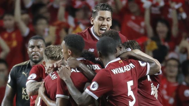 Liverpool players celebrate after Philippe Coutinho scored a goal against Leicester.