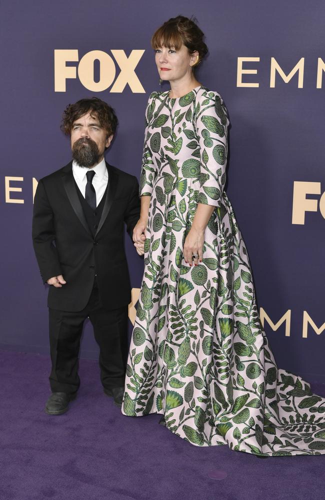 Peter Dinklage, left, and Erica Schmidt arrive at the 71st Primetime Emmy Awards. Picture: AP