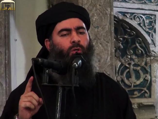 Abu Bakr al-Baghdadi, aka Caliph Ibrahim, addressing Muslim worshippers at a mosque in the militant-held northern Iraqi city of Mosul.