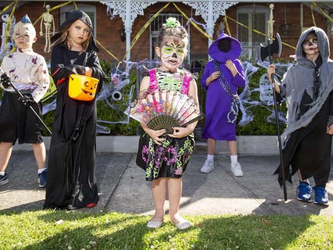 Harvey, 8, and Mischa, 8, Haywood, and Ella, 3,  Samuel, 10, and Joshua, 7, Nixon, in Renwick Street, Drummoyne, today.Picture: Justin Lloyd.