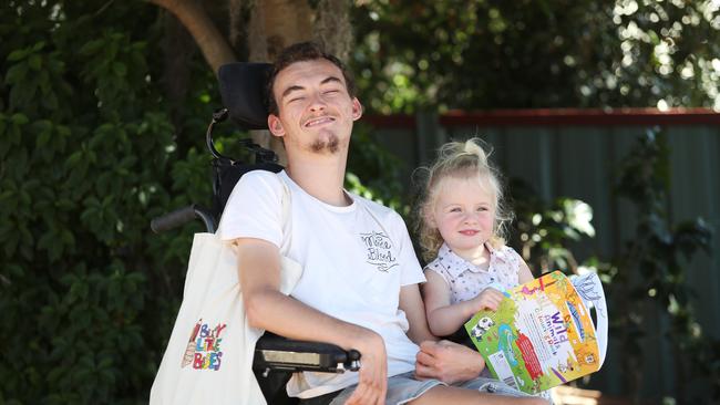 Tom Brewer, 20, pictured with his two-year-old niece Lucy Martin, has started Busy Little Bosses, an online business selling kids activity packs. Picture: Sue Graham