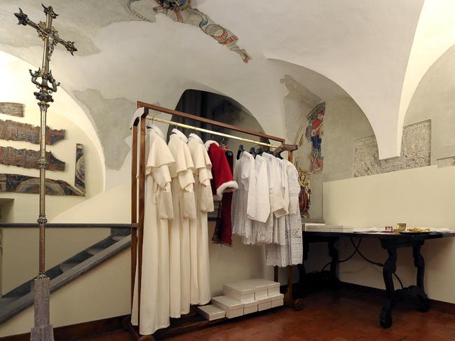 The “Room of Tears”, a small room next to the Sistine Chapel with the vestments of the next Pope displayed in three different sizes, before the start of the 2013 conclave. Picture: AFP