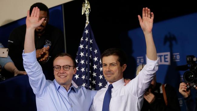 South Bend Mayor Pete Buttigieg, right, with husband Chasten Buttigieg after announcing his presidential candidacy for 2020. Picture: Joshua Lott/AFP