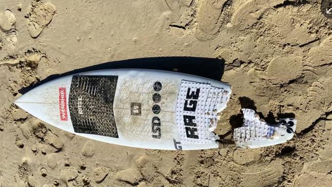 His surfboard was broken in half after the attack. Picture: NSW Police