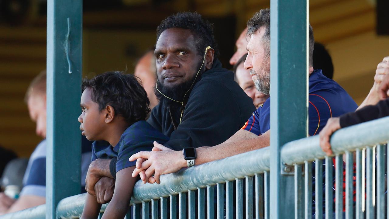 Former Melbourne and Port Adelaide star Liam Jurrah watches his former teams in action. Picture: Michael Willson/AFL Photos via Getty Images