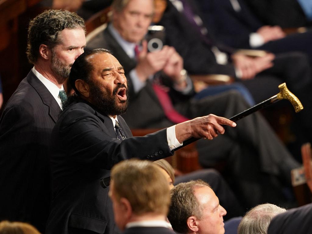 US Representative Al Green disrupts US President Donald Trump. Photo by ALLISON ROBBERT / AFP