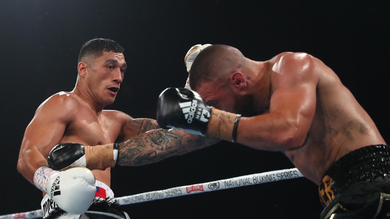 Jai Opetaia (L) punches Ben Kelleher will be back in action early next year. Photo: Getty Images