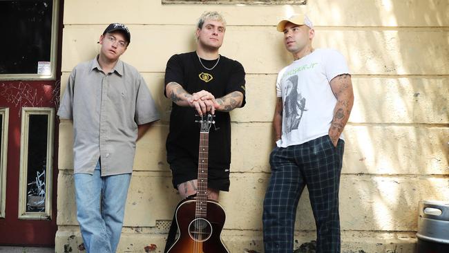 Sydney indie rock trio DMA'S ahead of the release of its fourth album ‘How Many Dreams?’, wherein the group has deployed enough hooks to equip a fishing fleet, powered by walls of six-string sound. L-R: Tommy O’Dell, Johnny Took and Matt Mason. Picture: John Feder