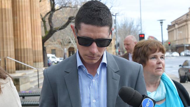 Truck driver Darren Hicks outside Adelaide Magistrates Court, after he was ordered to stand trial over the fatal freeway crash in 2014 Picture: AAP/David Mariuz