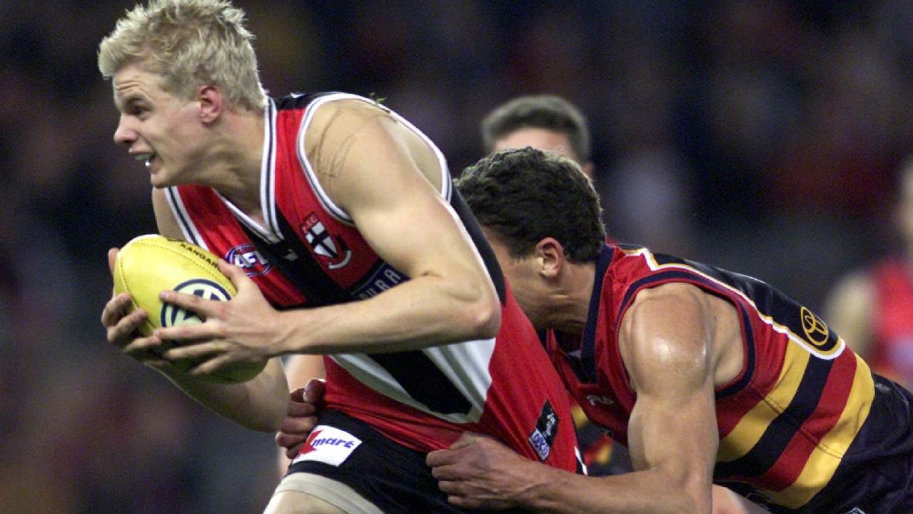 Nick Riewoldt gets his first touch on debut in 2001.