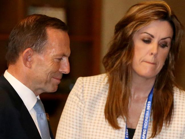 FILE PHOTO of Peta Cradlin, chief of staff to PM Tony Abbott, and her boss at the Trans-Pacific Partnership Leaders meeting in Bali in 2013. FILE PHOTO.