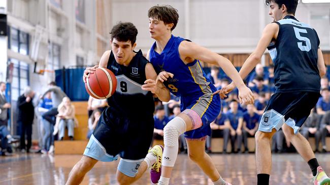 Ben Balthes (right) setting a screen for Lebron Brooks (left). GPS First V basktetball game between Churchie and Brisbane Boys Grammar. Saturday September 3, 2022. Picture, John Gass