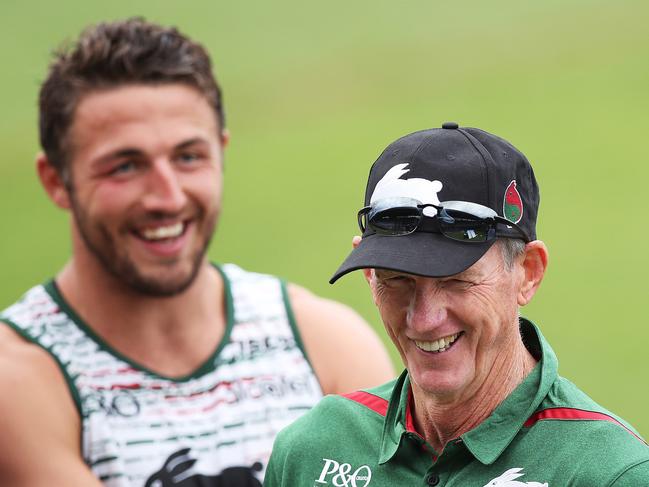 Wayne Bennett has a laugh with Rabbitohs plater Sam Burgess at Redfern Oval for his first session as Souths coach. Picture. Phil Hillyard