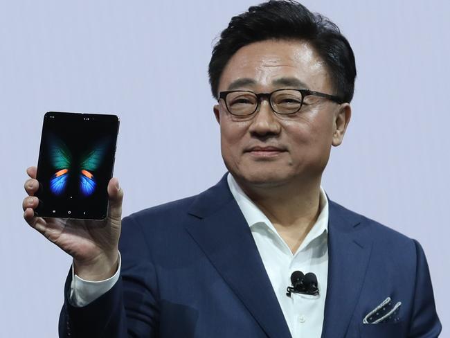 Samsung's Mobile Division President and CEO DJ Koh holds the new Samsung Galaxy Fold smartphone. Picture: Getty/AFP