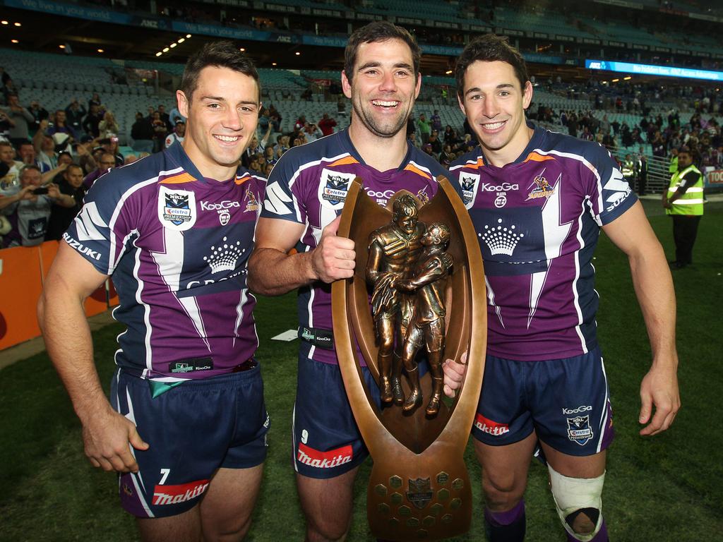 Cooper Cronk, Cameron Smith and Billy Slater celebrate premiership glory in 2012.