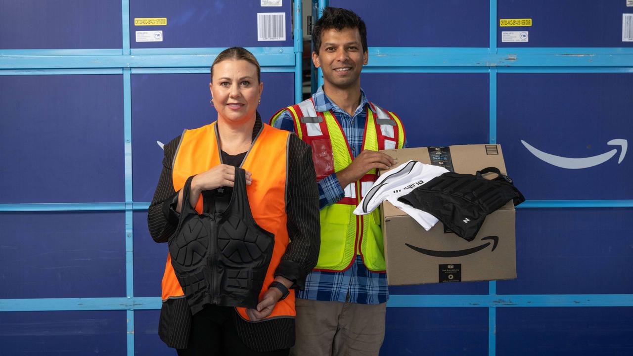 Donna Johnson and Amazon Geelong’s site manager Nigel Tauro. Picture: Brad Fleet.