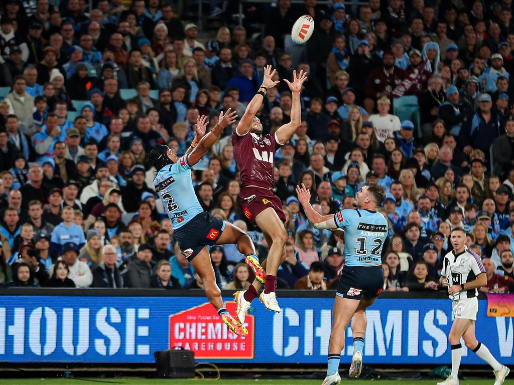 Xavier Coates and Brian To'o competing for the footy.