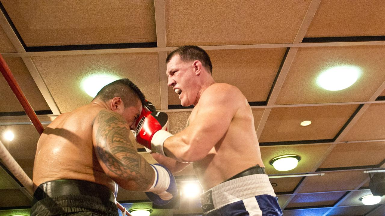 Paul Gallen and Herman Ene-Purcell fight it out in Toowoomba. Friday, Jan 29, 2016.