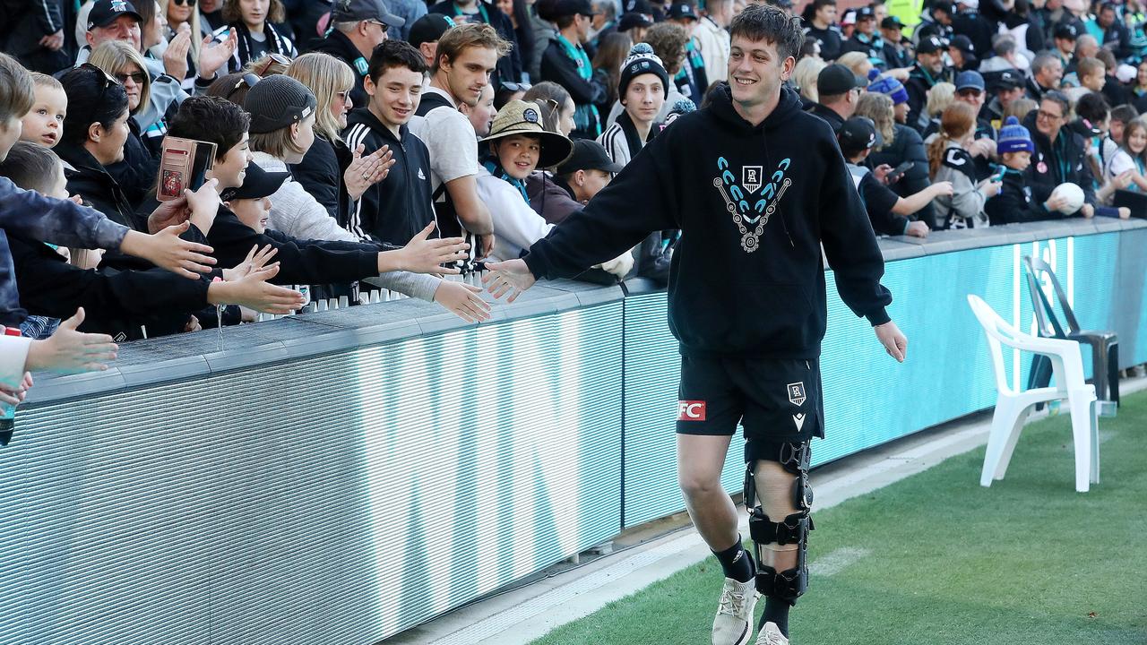 Zak Butters in a knee brace. Not what we wanted to see. Picture: Sarah Reed/AFL Photos via Getty Images