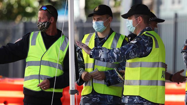 Police at the Queensland border in Griffith Street, Coolangatta. Picture: NIGEL HALLETT