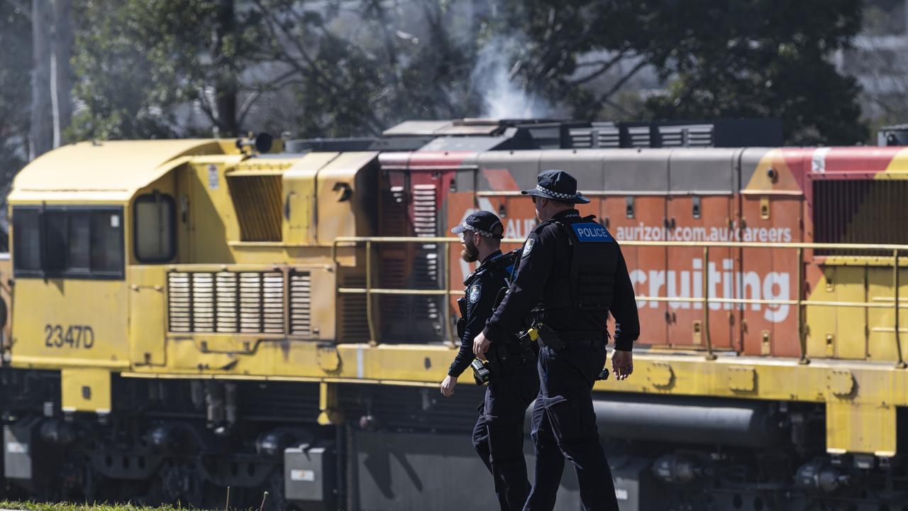 Emergency services attend a train fire near the intersection of Mort and North Sts, Thursday, July 11, 2024. Picture: Kevin Farmer