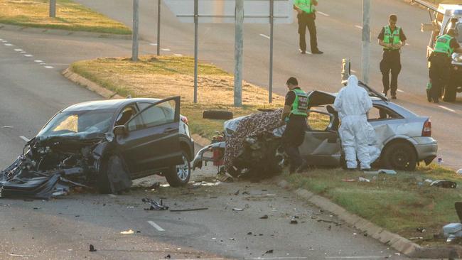 Police investigate the scene of a horror crash on Trower Rd at Lakeside Drv overnight. Picture Glenn Campbell