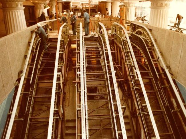 Photo of the escalator being installed at Parliament Station in 1983. They were reportedly the longest escalators in the southern hemisphere when installed. Picture: PROV