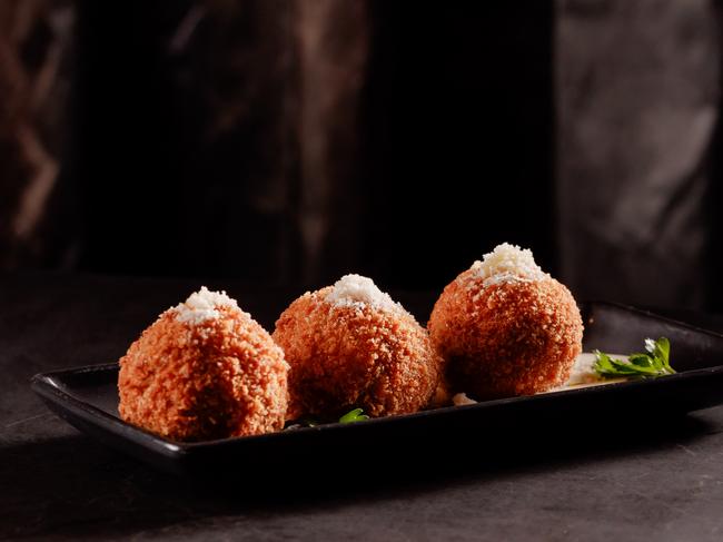 Arancini balls with ragu, tomato and fontina at Black Hide by Gambaro at Treasury Brisbane Casino