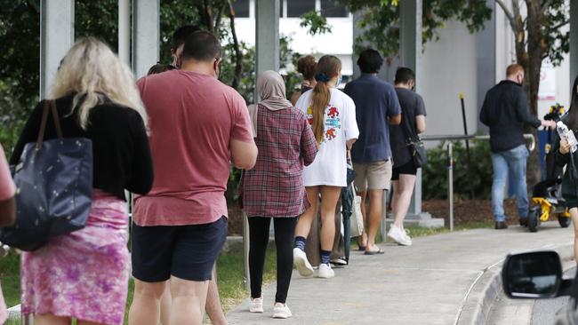 BRISBANE, AUSTRALIA - NewsWire Photos - JANUARY 6TH 2022:  Brisbane residents pictured queuing for testing at the Royal Brisbane WomenÃs Hospital due to the recent Covid-19 Omicron strain outbreak.  Picture: NCA NewsWire / Josh Woning