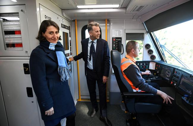 NSW Premier Gladys Berejiklian and NSW Minister for Transport Andrew Constance ride a new Waratah Series 2 train in Sydney. Picture: Joel Carrett