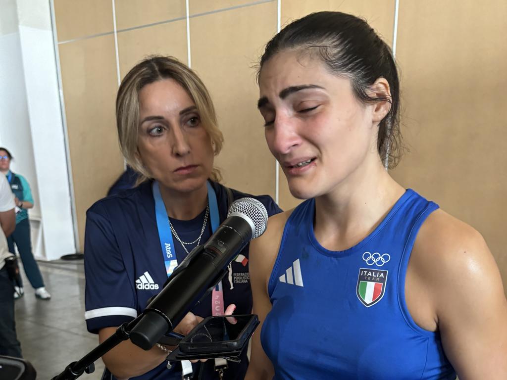 Angela Carini of Team Italy reacts after abandoning the fight.