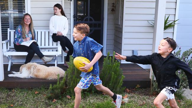 Melbourne mother Niki Rogers at home with her children Ruby, Harvey and Sam. Picture: Aaron Francis