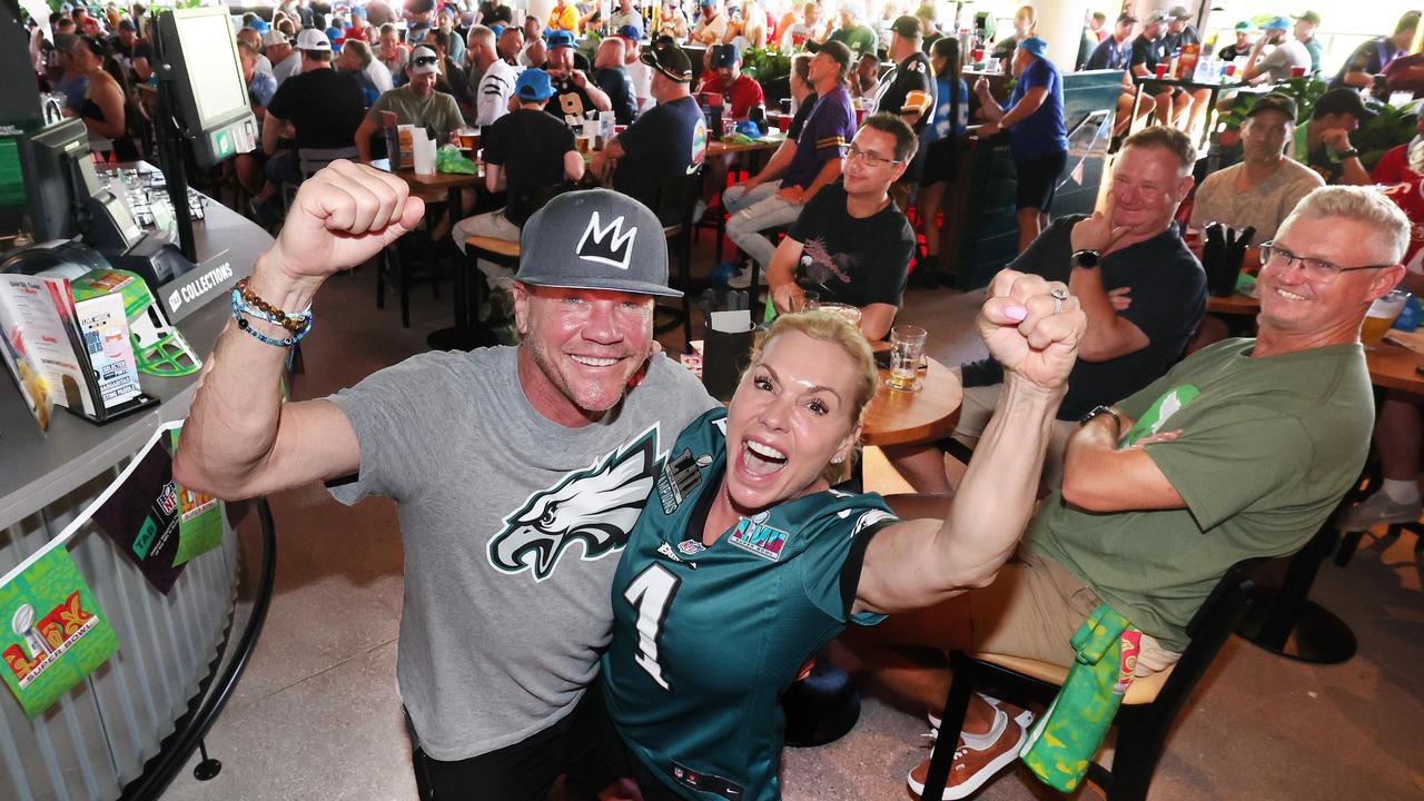 Super Bowl fever took over the Gold Coast Monday with a sellout crowd celebrating the NFL showdown at The Sporting Globe at Surfers Paradise. Philadelphia Eagles fans and natives Colby Rebel and John Sender cheer their team to victory. Picture Glenn Hampson