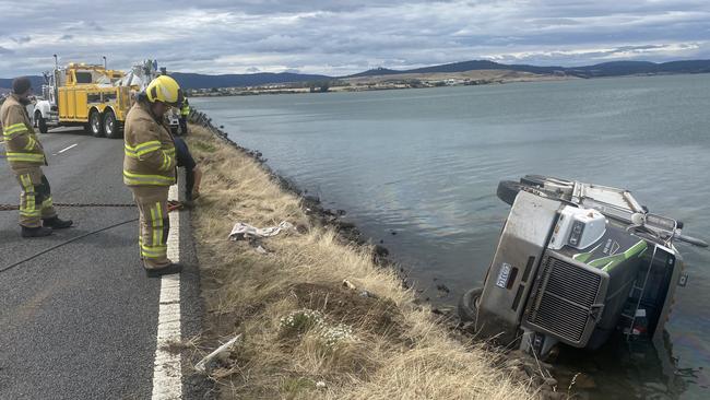 A truck crashed into the water on the Tasman Highway on the causeway between Midway Point and Sorell, March 9, 2023. Photo: Judy Augustine