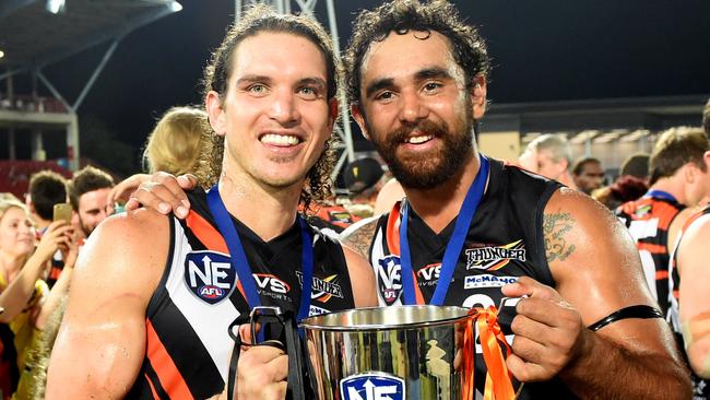 Cameron Ilett and Richard Tambling hold the 2015 NEAFL premiership cup won four years after the 2011 breakthrough win.