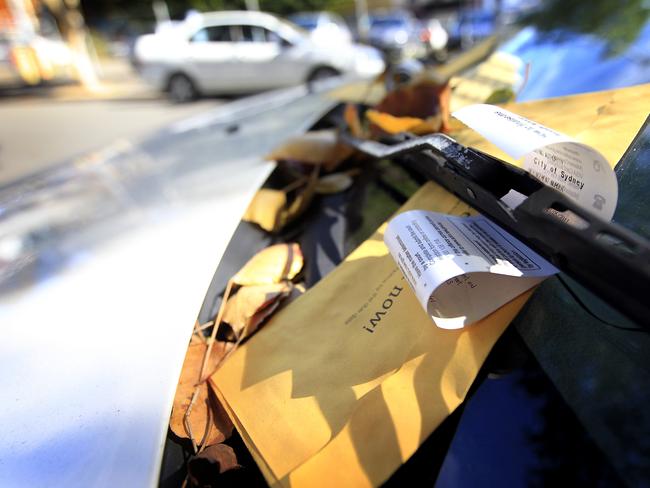 Generic photographs of parking tickets, City of Sydney (Surry Hills). Ranger, fine, car,