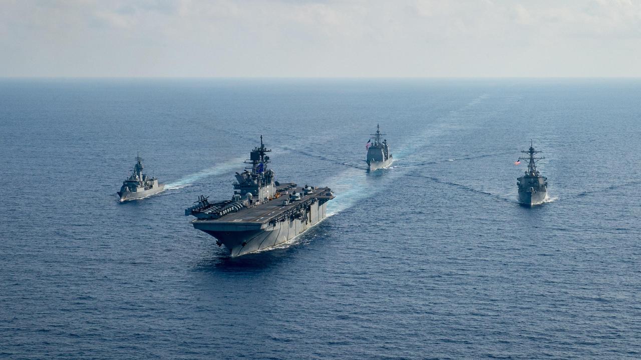 Royal Australian Navy helicopter frigate HMAS Parramatta travels through the South China Sea with US naval ships. The US and Australia are highly critical of China’s claims of vast swathes of the seas in south east Asia.