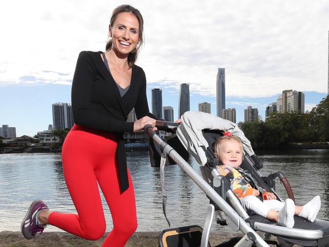 Amanda Abate will be doing the Gold Coast Marathon 5km event pushing daughter Pia 10months in a pram. Amanda and Pia out training.  Picture Glenn Hampson