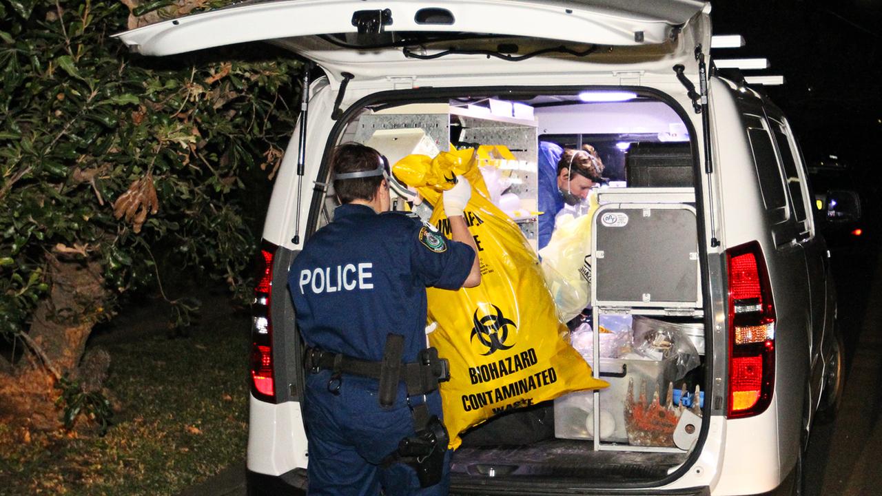 North Shore Police clear contaminated items from the Greenwich house after a second decomposing body was found a year after the first. Picture: Danny Casey
