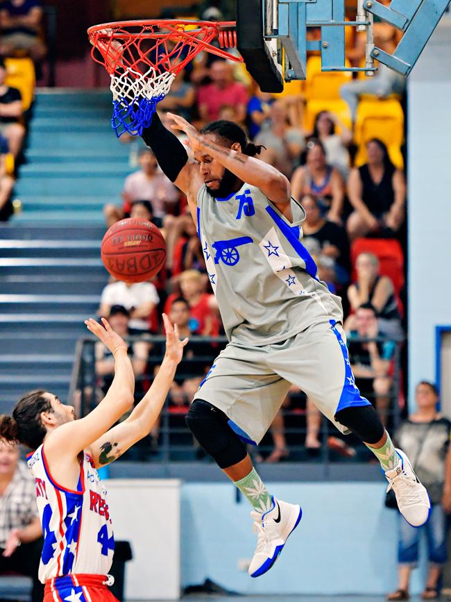 Deba George throws down a dunk for Essington against Uni Rebels during the 2017 DBA final. Picture: Michael Franchi